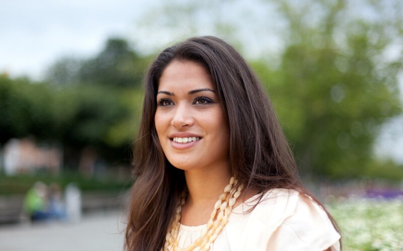 woman smiling outdoors