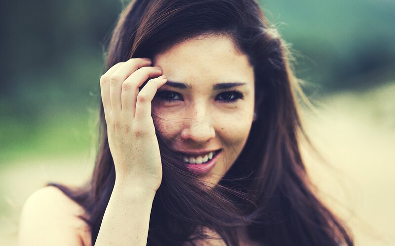 woman smiling outdoors