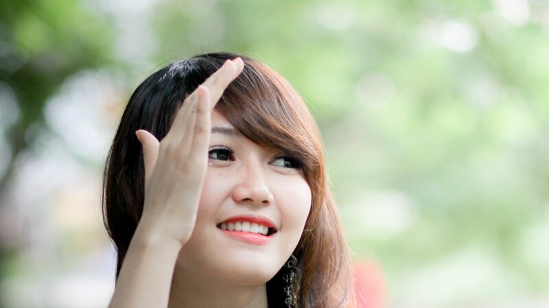 woman smiling outdoors
