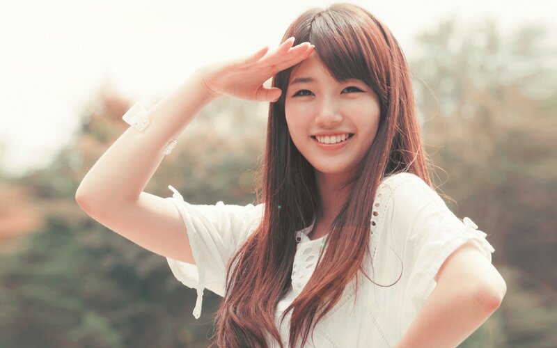 woman smiling outdoors