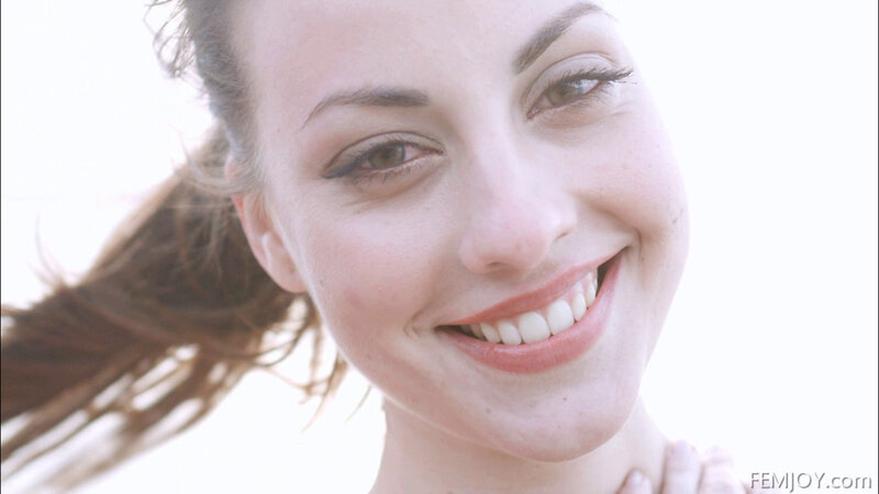woman smiling outdoors