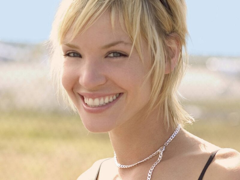 woman smiling outdoors