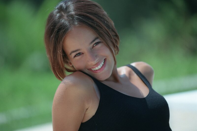 woman smiling outdoors