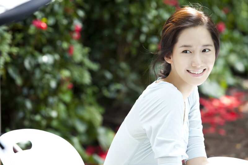 woman smiling outdoors