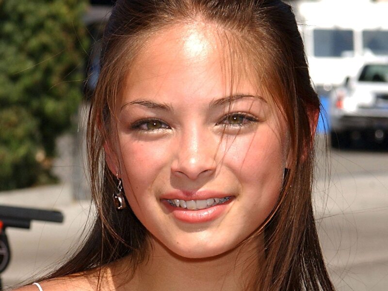 woman smiling outdoors