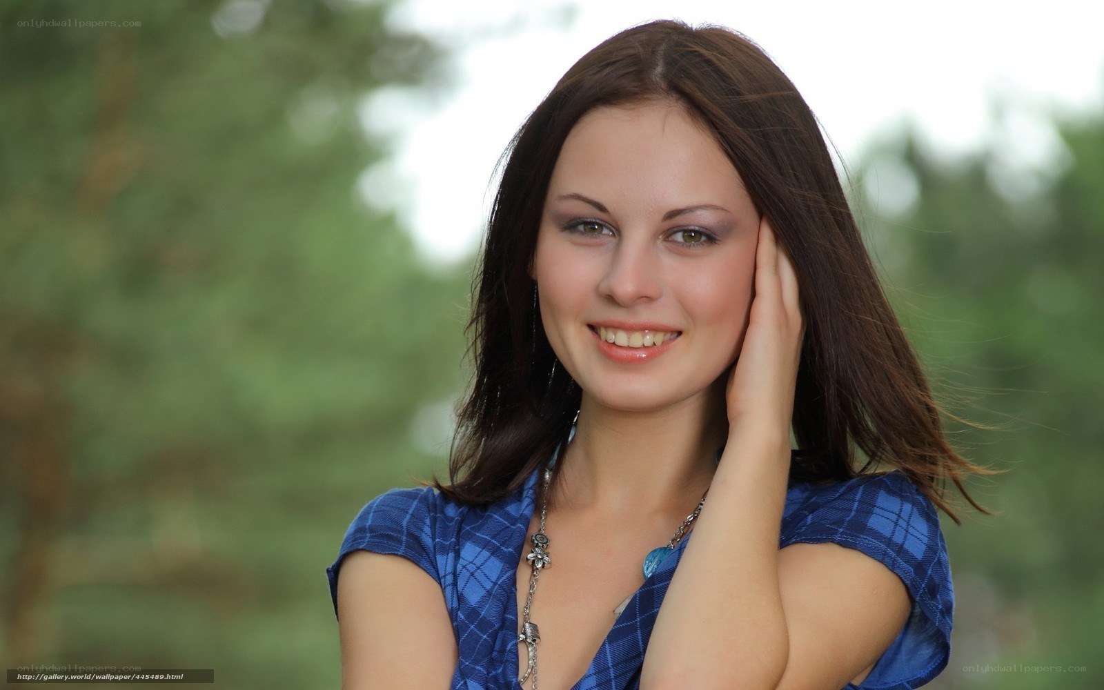 woman smiling outdoors