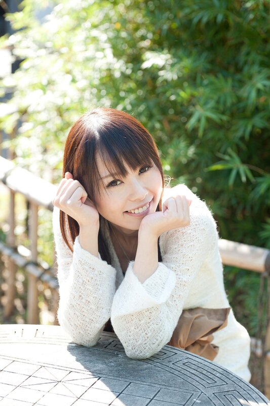 woman smiling outdoors