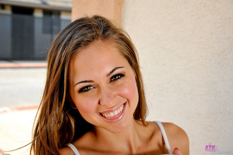 woman smiling outdoors