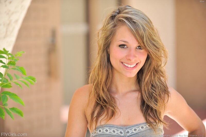 woman smiling outdoors