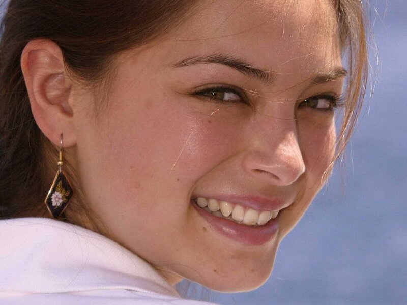 woman smiling outdoors