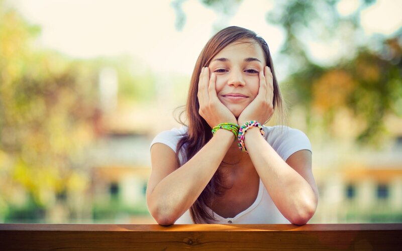 woman smiling outdoors