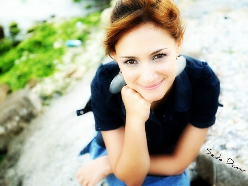 woman smiling outdoors