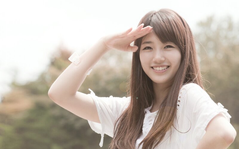 woman smiling outdoors