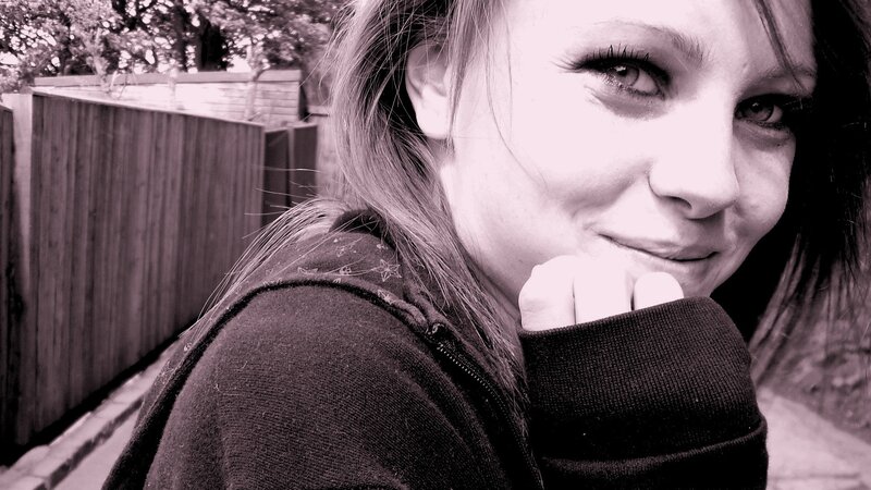 woman smiling outdoors