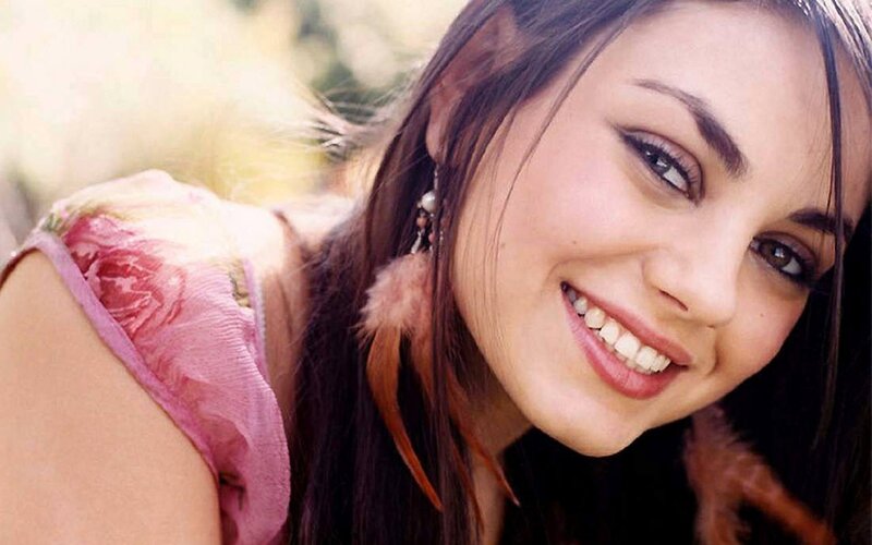 woman smiling outdoors