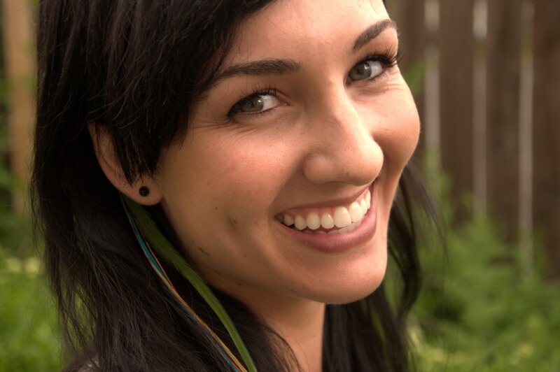 woman smiling outdoors