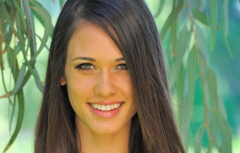 woman smiling outdoors