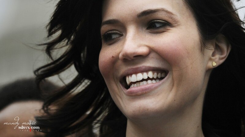 woman smiling outdoors