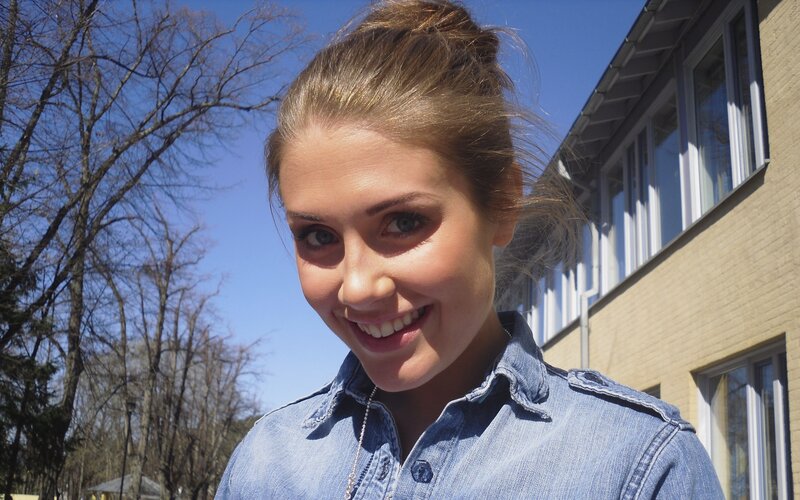 woman smiling outdoors