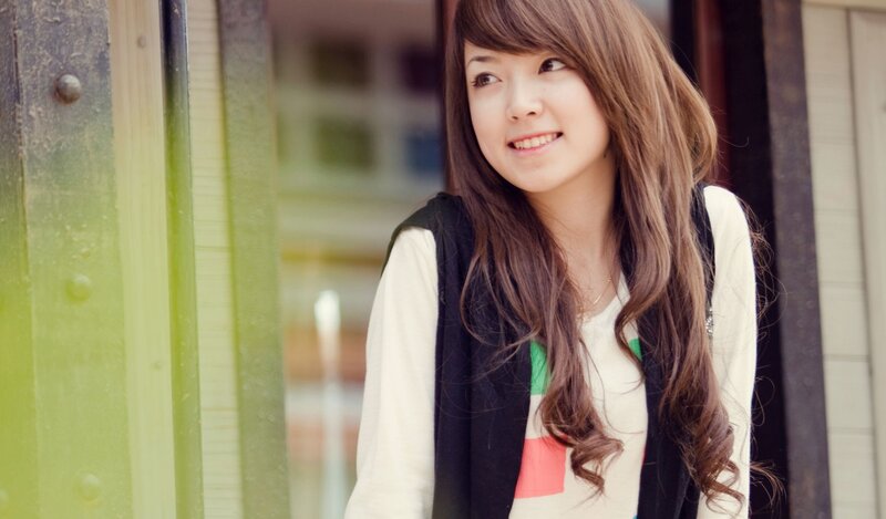 woman smiling outdoors