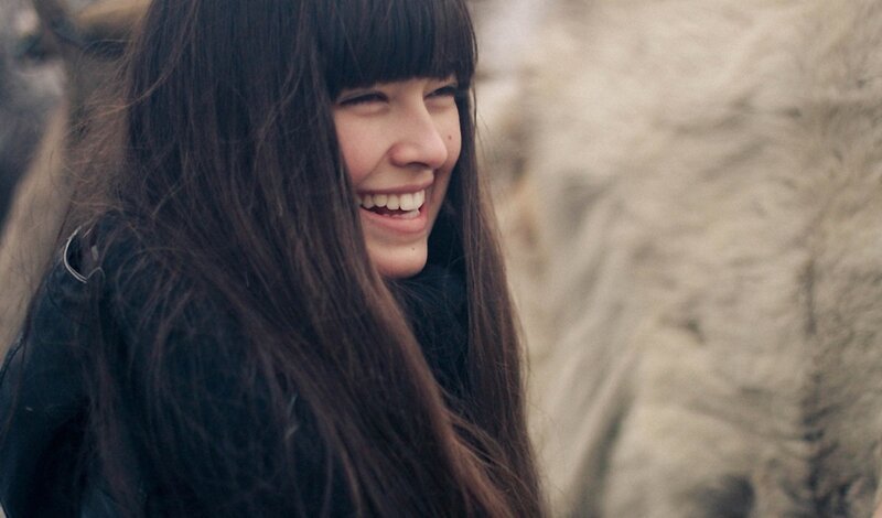 woman smiling outdoors