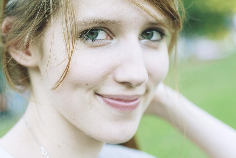 woman smiling outdoors