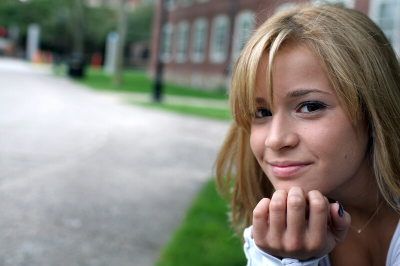 woman smiling outdoors