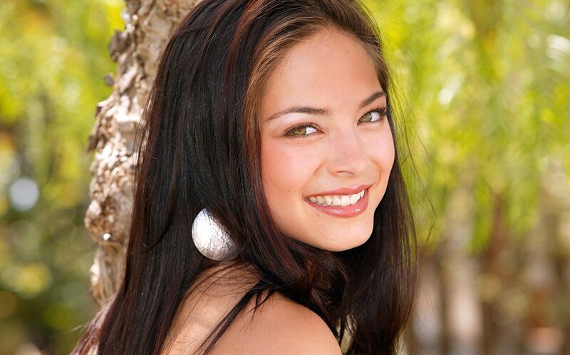 woman smiling outdoors