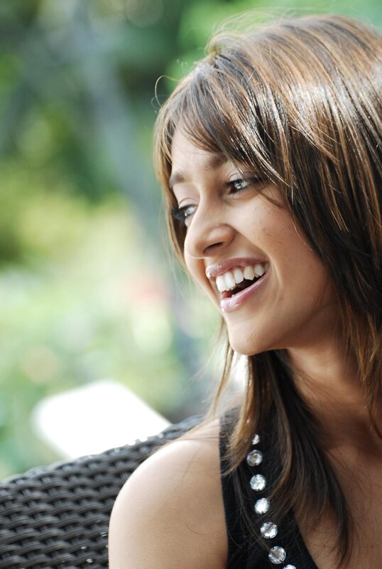 woman smiling outdoors