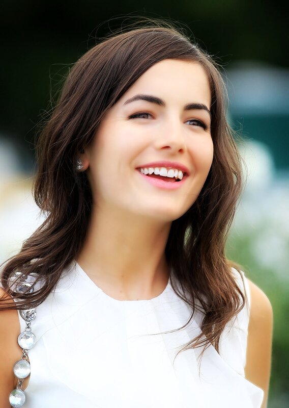 woman smiling outdoors