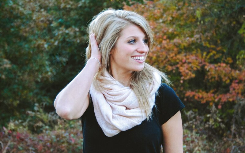 woman smiling outdoors