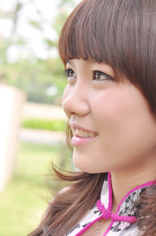 woman smiling outdoors