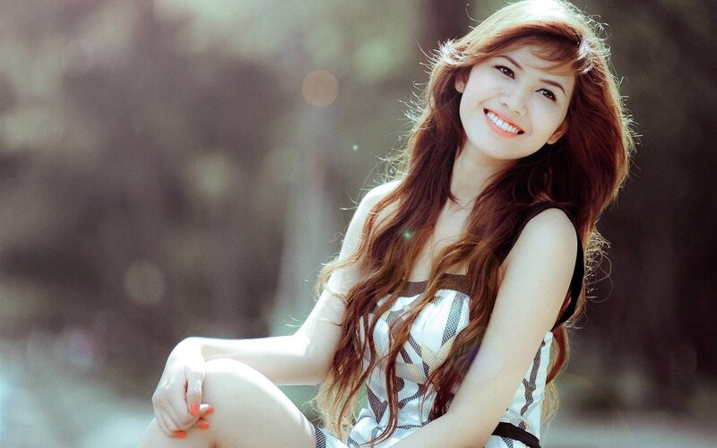 woman smiling outdoors