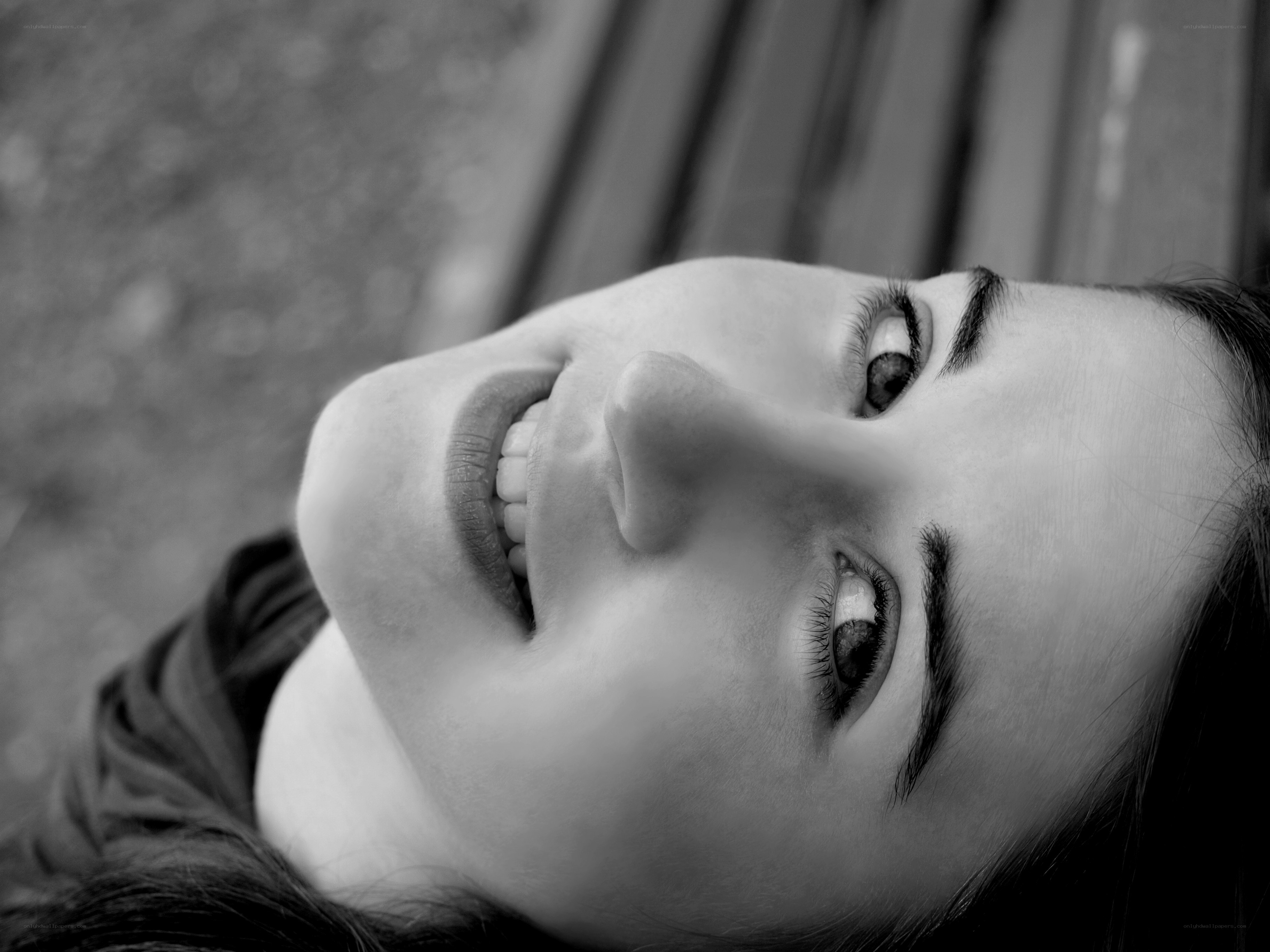 woman smiling up at camera