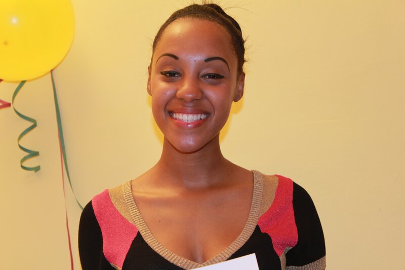 woman smiling with balloon