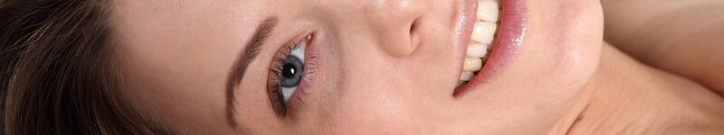 woman smiling with blue eyes