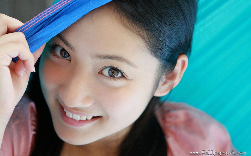 woman smiling with blue headband