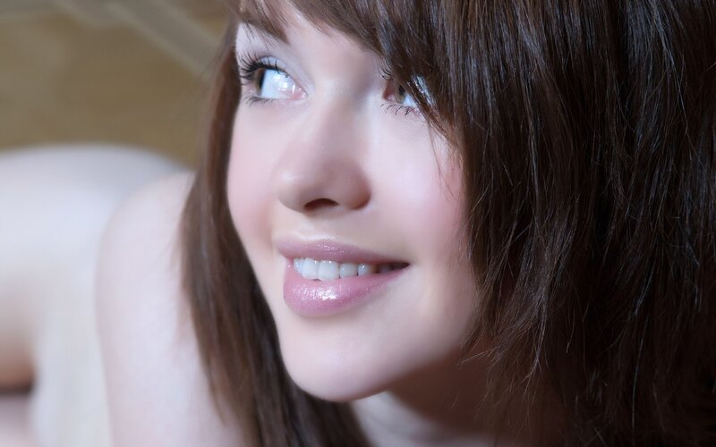woman smiling with brown hair