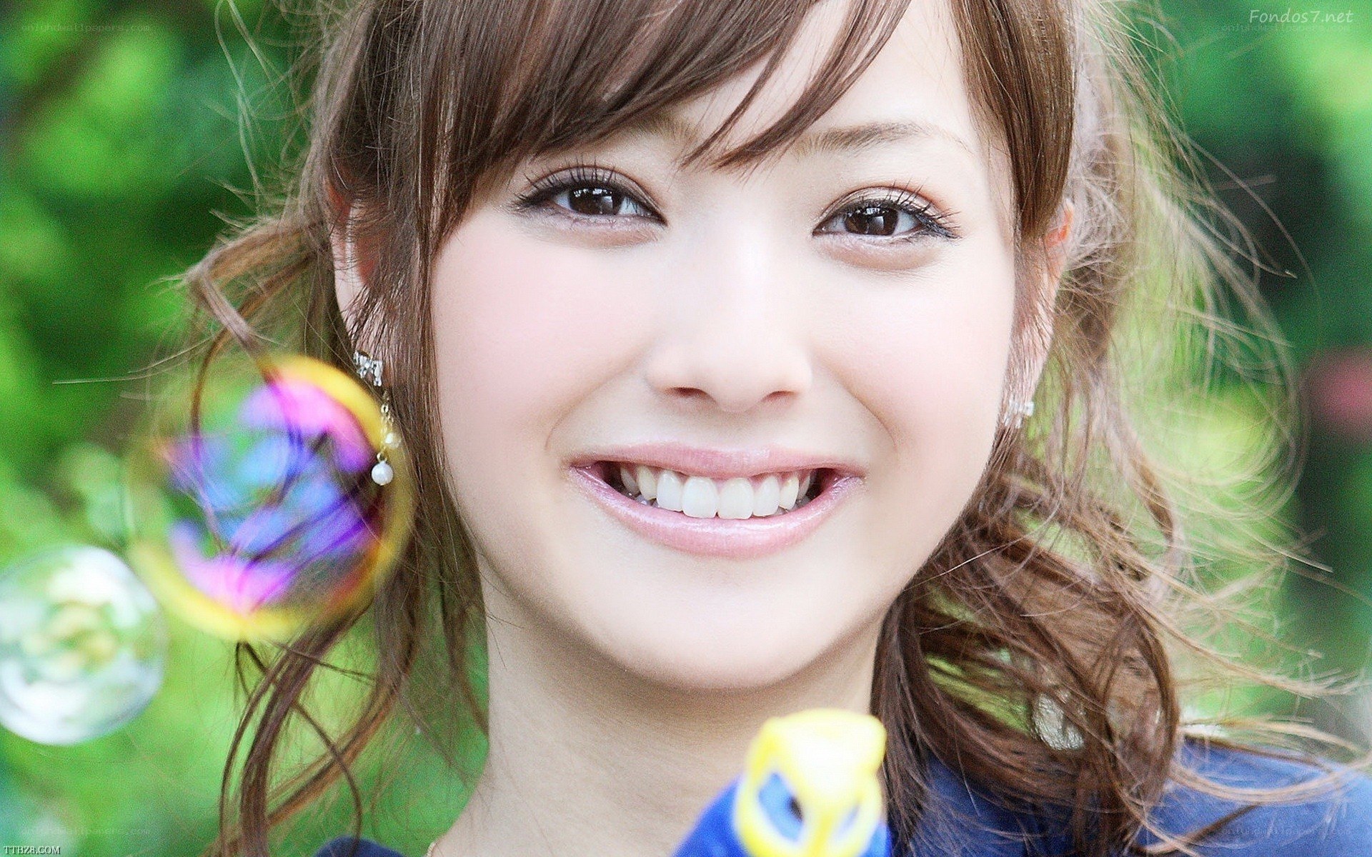 woman smiling with bubbles