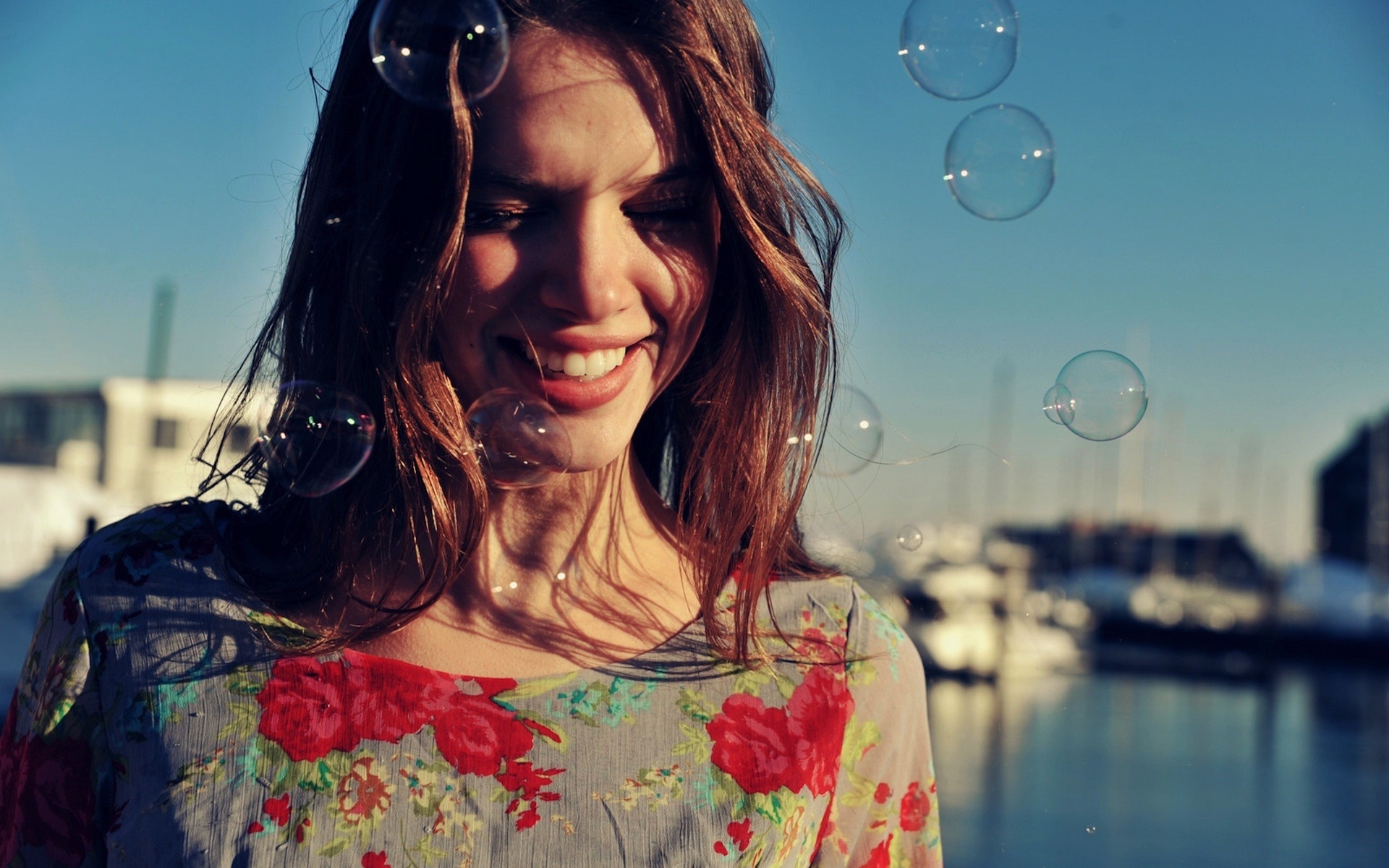 Woman smiling with bubbles