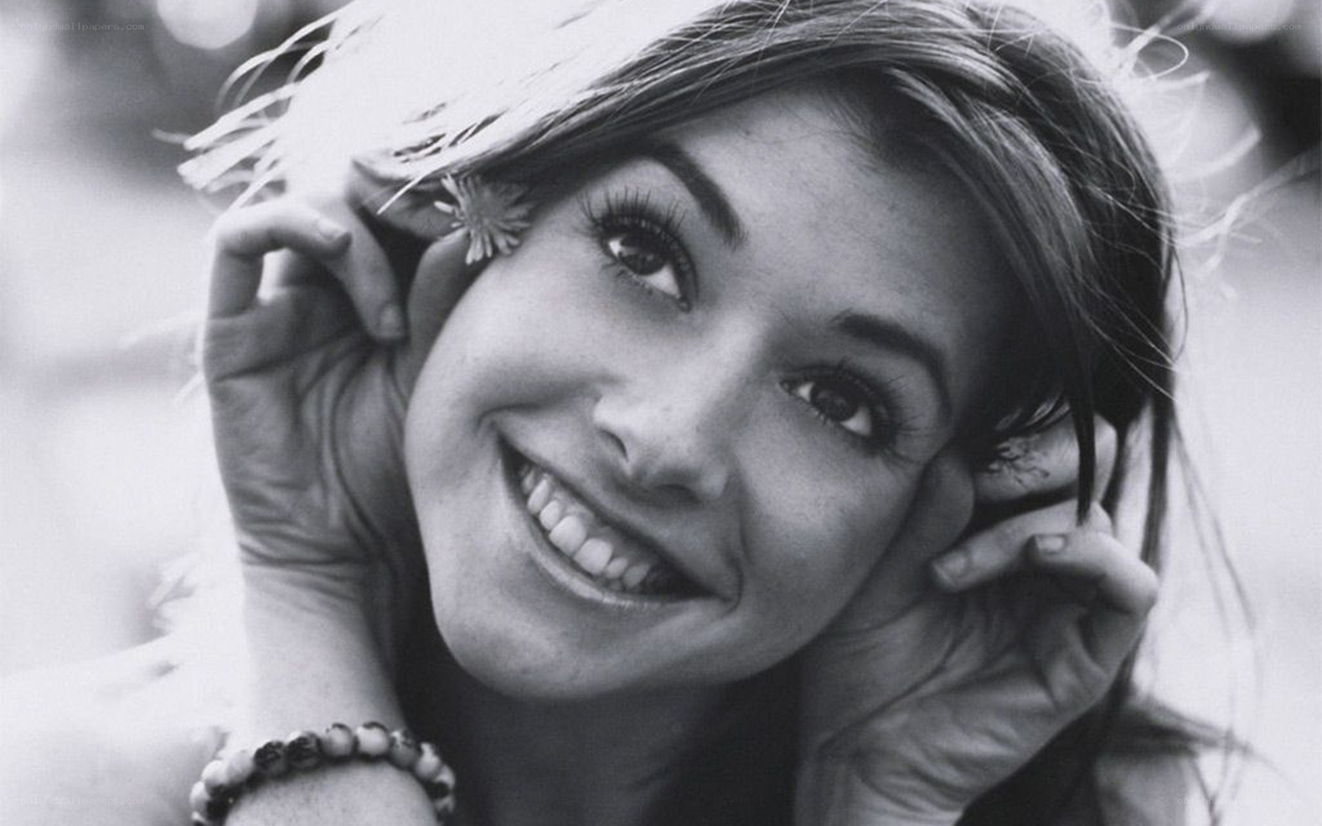 woman smiling with flower
