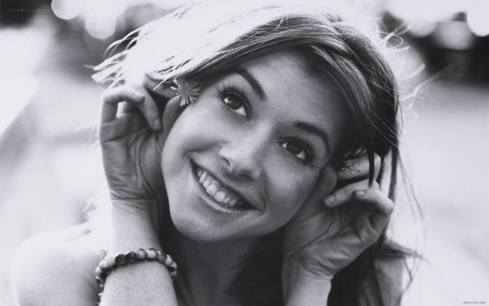 woman smiling with flower