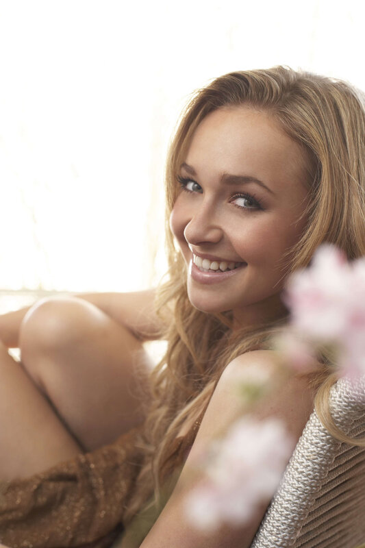 woman smiling with flowers
