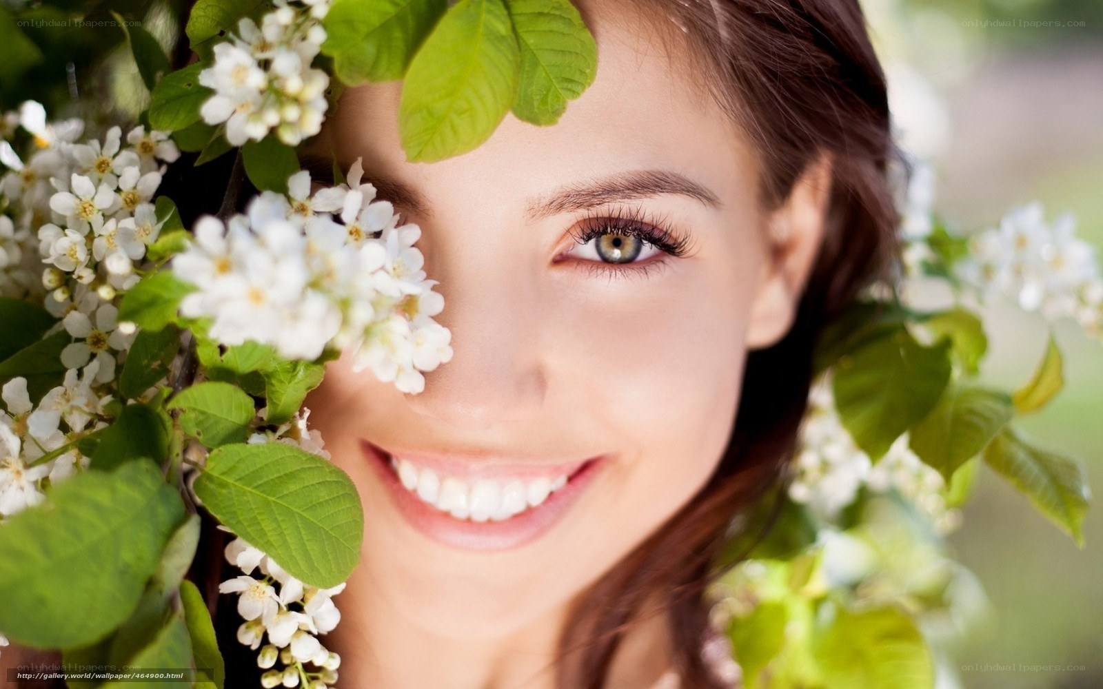 woman smiling with flowers