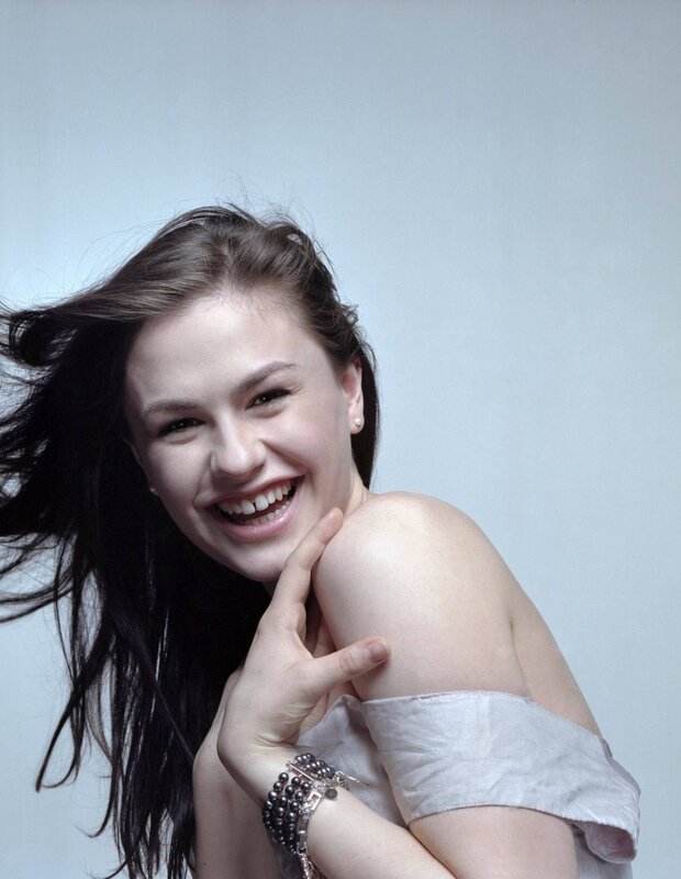 woman smiling with hair blowing