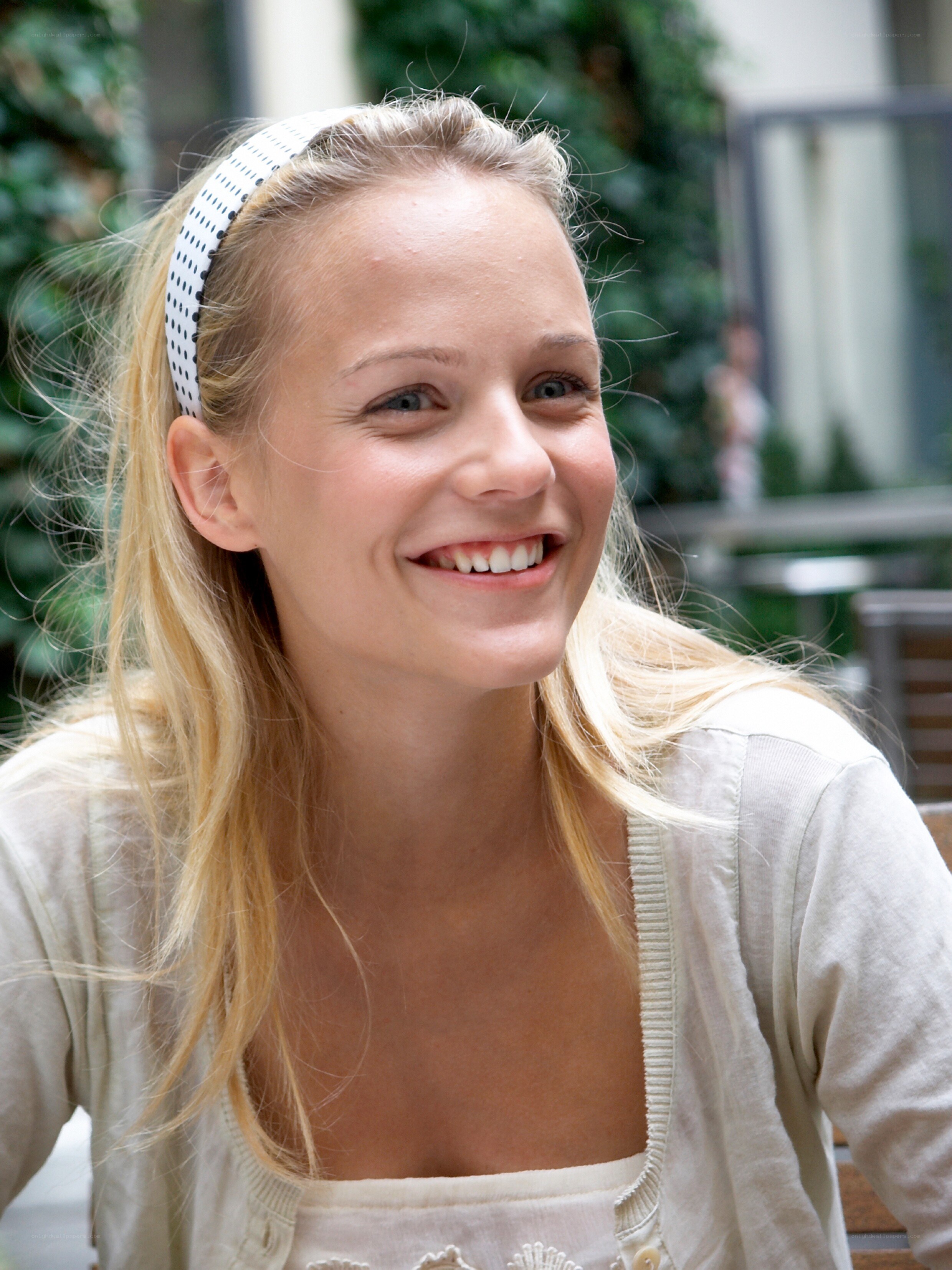 woman smiling with headband