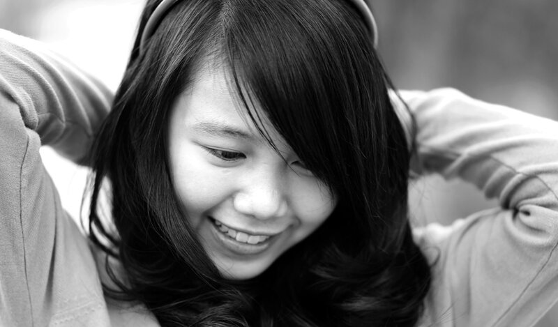 woman smiling with headphones