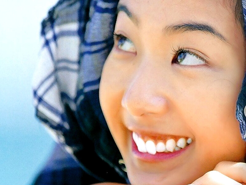 woman smiling with headscarf