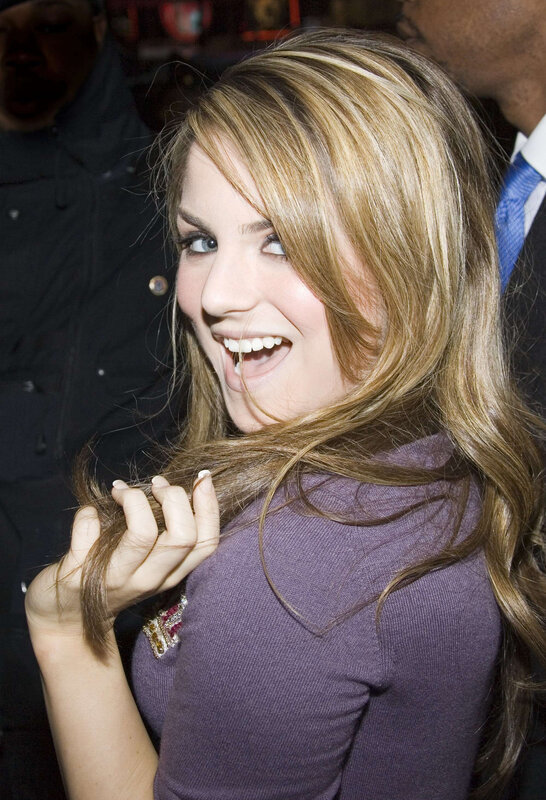 woman smiling with long hair