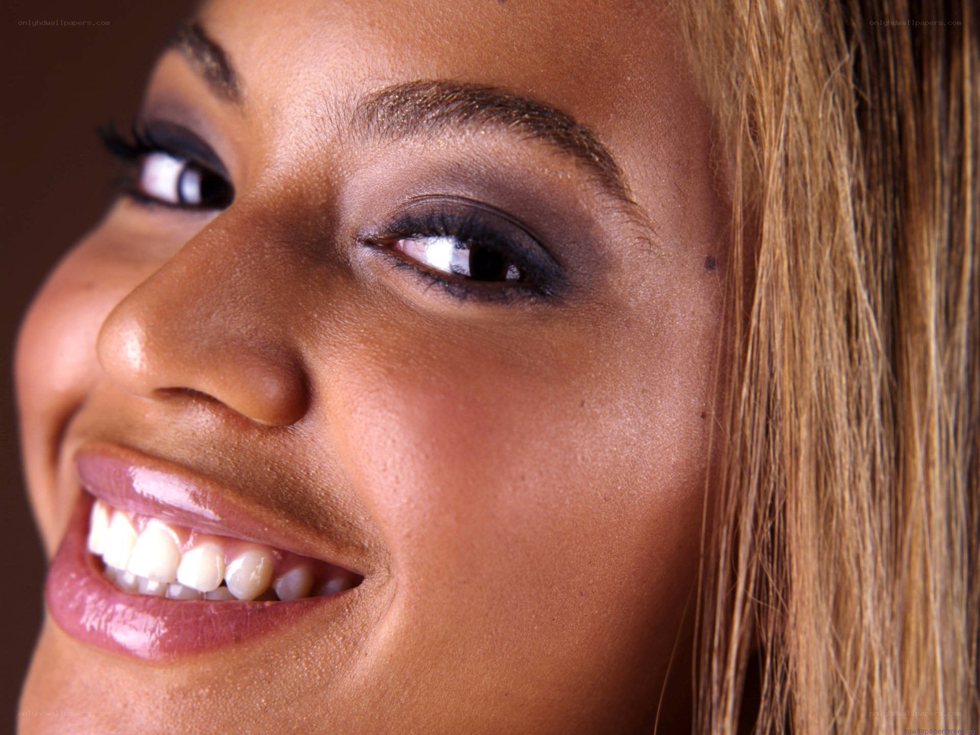 woman smiling with makeup